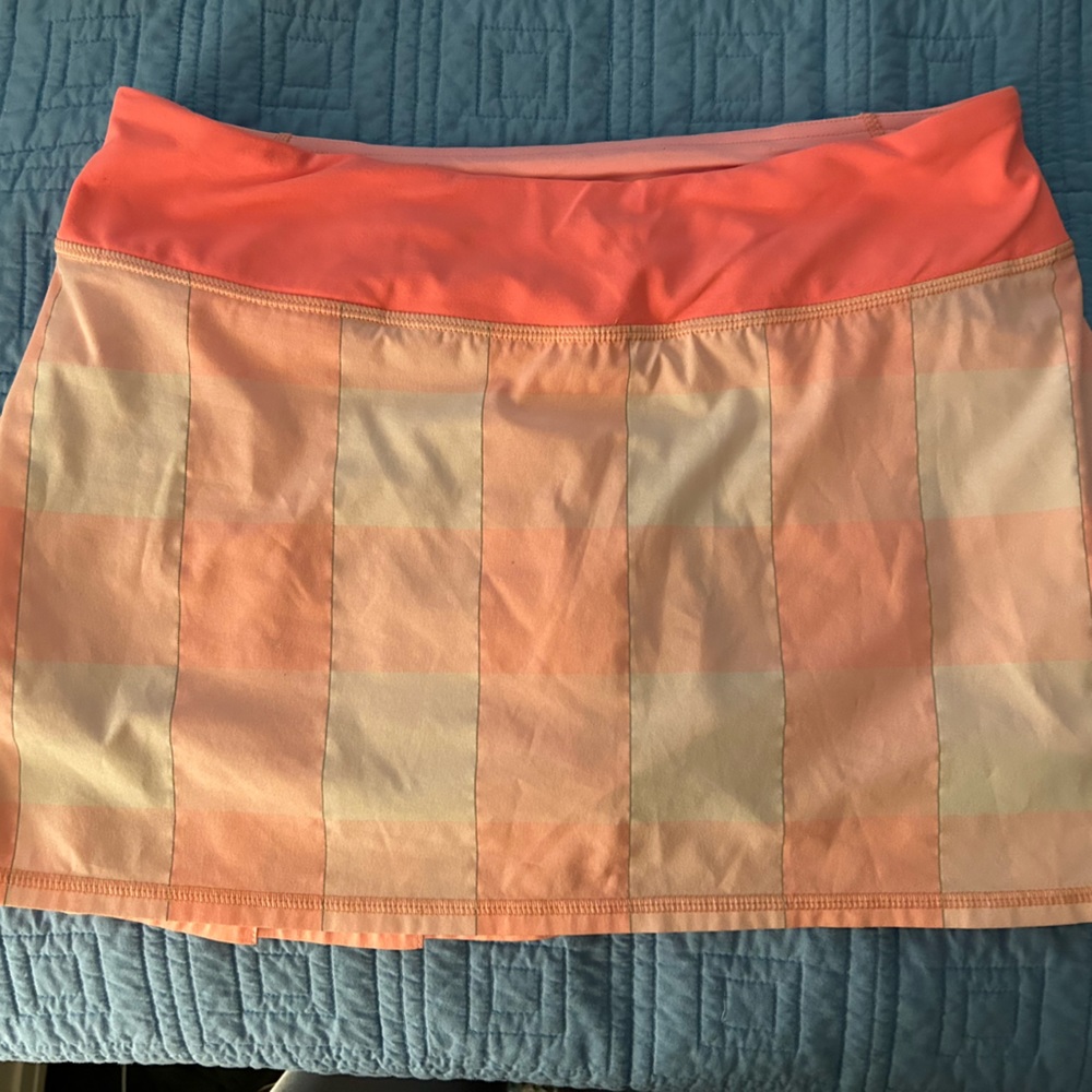 Lululemon skirt with cute pleats on the back.